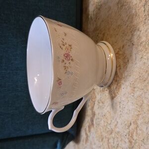 Vintage floral and gold rimmed tea cup made in china